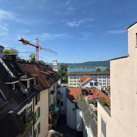 Séjour chez l'habitant Rustic Lakeside Gem With Rooftop Looking To